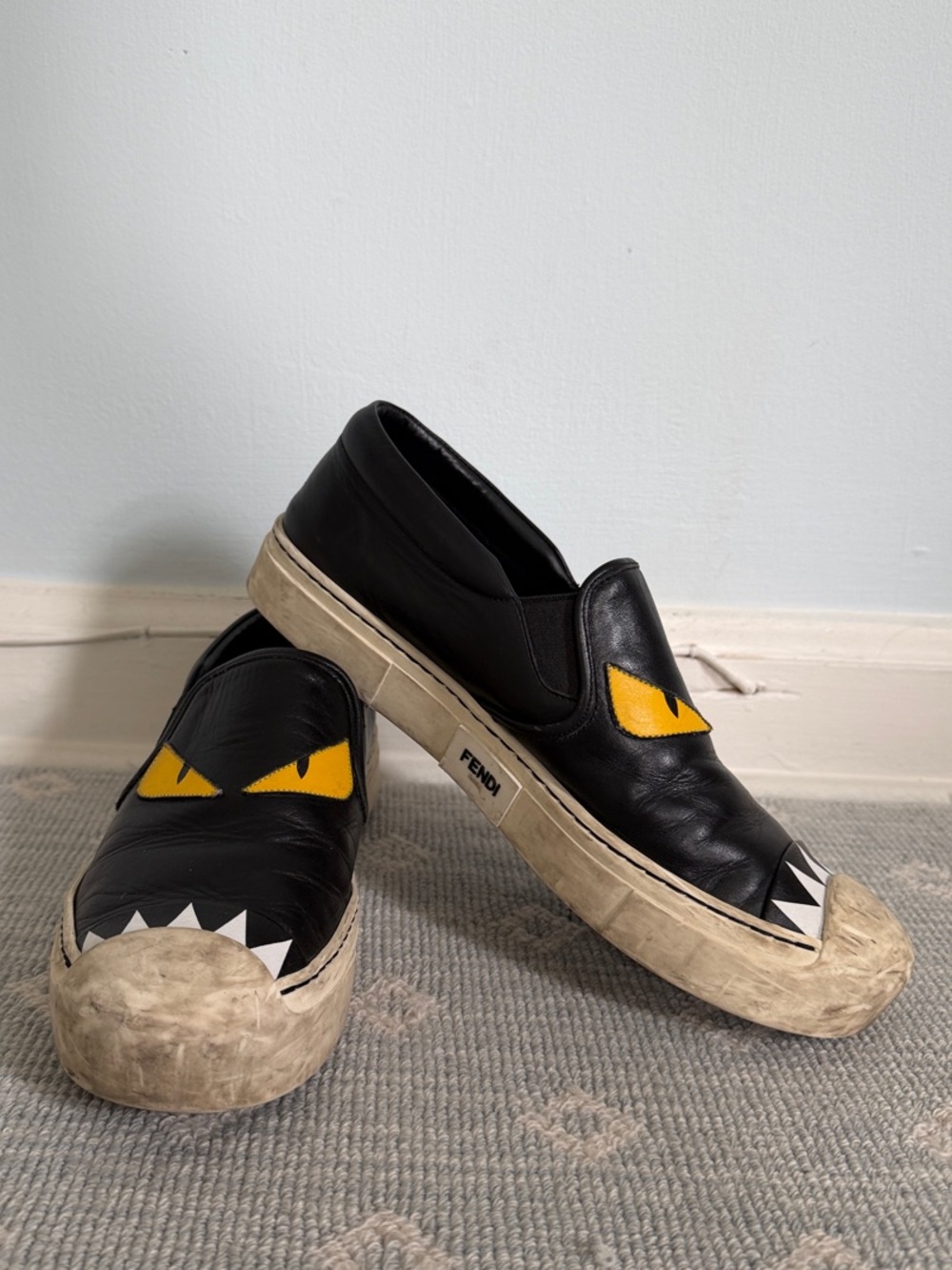 Fendi Women’s Monster Black Leather Slip-On Sneakers with Yellow Monster Eyes